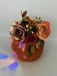 Világító kerámiatök ,díszített művirágokkal 